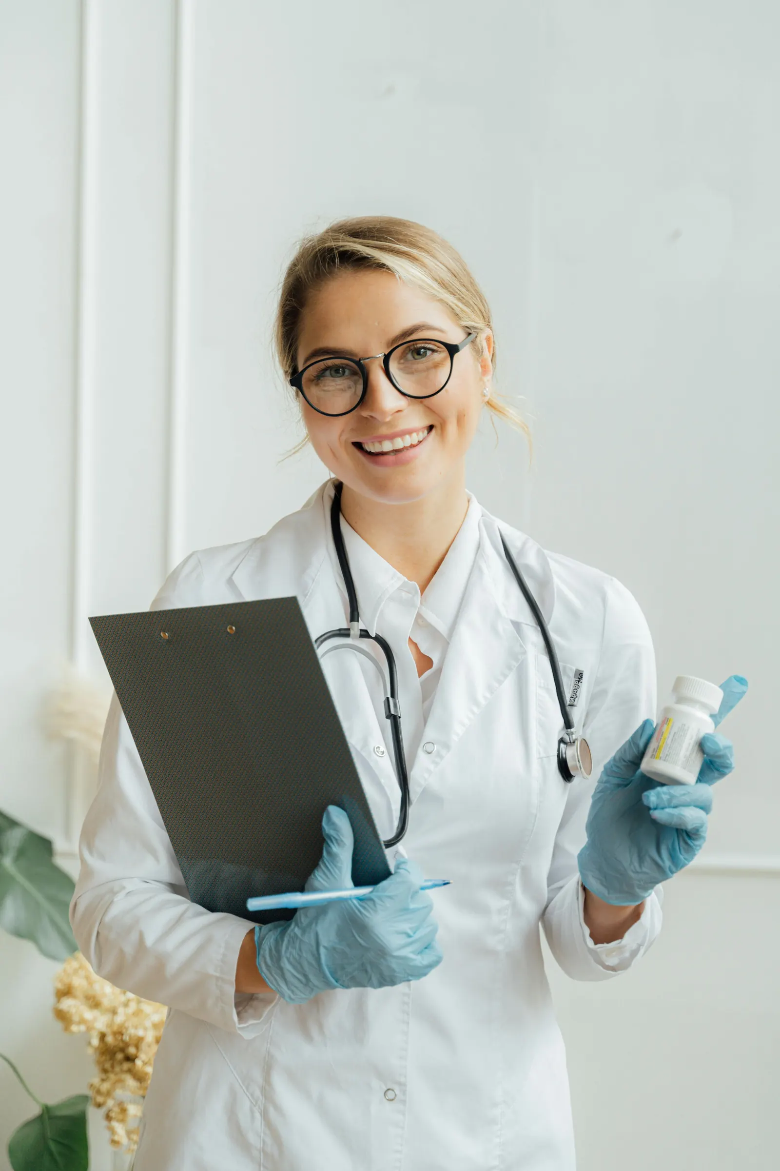 A doctor with notes and medication, ready for the day